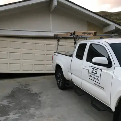 ZS Overhead Doors work truck at a job