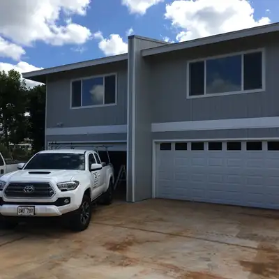 Two-story home with a finished garage door